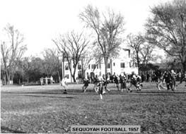 Football action in a 1957 game.